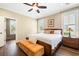Spacious main bedroom with hardwood floors, neutral walls, plantation shutters, and a walk-in closet at 3413 Acorn Drop Ln, Johns Island, SC 29455