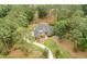 This aerial view shows the backyard of a large home with mature trees surrounding the property at 3601 Colonel Vanderhorst Cir, Mount Pleasant, SC 29466