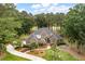 Expansive aerial view of the home showcasing its manicured landscaping and wooded surroundings at 3601 Colonel Vanderhorst Cir, Mount Pleasant, SC 29466