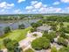 Beautiful aerial view of the community clubhouse and golf course, set against a picturesque waterfront backdrop at 3601 Colonel Vanderhorst Cir, Mount Pleasant, SC 29466