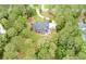 An aerial view of the backyard showing an outdoor patio area and seating at 3601 Colonel Vanderhorst Cir, Mount Pleasant, SC 29466