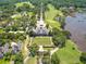 Sweeping aerial capturing golf course, clubhouse, scenic river, and surrounding real estate at 3601 Colonel Vanderhorst Cir, Mount Pleasant, SC 29466