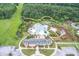 Aerial of community center featuring a pool area, playground, and lush landscaping at 3601 Colonel Vanderhorst Cir, Mount Pleasant, SC 29466