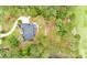 This aerial view showcases the home, pool, mature trees, and lush landscaping at 3601 Colonel Vanderhorst Cir, Mount Pleasant, SC 29466