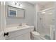 Bathroom featuring white vanity with quartz countertop, chrome fixtures, toilet, and glass shower stall at 3601 Colonel Vanderhorst Cir, Mount Pleasant, SC 29466
