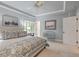 Bedroom featuring carpet, blue walls, queen bed with blue and white patterned bedding, and window at 3601 Colonel Vanderhorst Cir, Mount Pleasant, SC 29466