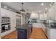 Spacious kitchen featuring custom cabinets, stainless steel appliances, and a large center island at 3601 Colonel Vanderhorst Cir, Mount Pleasant, SC 29466