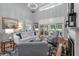 Bright and airy living room with soaring ceilings, fireplace, and comfortable seating at 3601 Colonel Vanderhorst Cir, Mount Pleasant, SC 29466