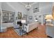 Bright living room with fireplace, built-in shelves, and an open floor plan at 3601 Colonel Vanderhorst Cir, Mount Pleasant, SC 29466