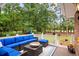 Covered deck featuring comfortable seating, a scenic view of the green landscape, and an inviting atmosphere at 3601 Colonel Vanderhorst Cir, Mount Pleasant, SC 29466