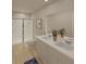 Clean and modern bathroom with double vanity, walk-in shower, and neutral decor at 4111 Rising Tide Dr, Summerville, SC 29485