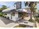 Charming coffee shop exterior with outdoor seating and local coffee, beer, and wine signage at 4111 Rising Tide Dr, Summerville, SC 29485