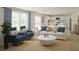 Cozy living room with neutral walls, lots of sunlight and stylish furnishings at 4111 Rising Tide Dr, Summerville, SC 29485