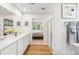 Bright bathroom featuring double vanity, walk-in shower with glass enclosure and view to the bedroom at 4147 Rising Tide Dr, Summerville, SC 29485