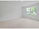 Bedroom with plush carpet and two windows that offer natural light at 4147 Rising Tide Dr, Summerville, SC 29485