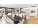 Open-concept dining room and kitchen with sleek countertops and stainless-steel appliances adjoining to an inviting living space at 4147 Rising Tide Dr, Summerville, SC 29485