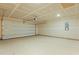 Spacious two car garage with an automatic door and concrete flooring, perfect for parking and storage at 4147 Rising Tide Dr, Summerville, SC 29485