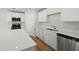 Bright kitchen showcasing modern appliances and a spacious quartz countertop island at 4147 Rising Tide Dr, Summerville, SC 29485