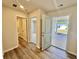 Open door in living space leading to outdoor area and showing bathroom and bedroom doors at 4147 Rising Tide Dr, Summerville, SC 29485
