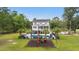 Aerial view of home and backyard with pool and playground at 4205 Cobble Trot Way, Johns Island, SC 29455