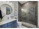 Well-lit bathroom featuring a glass enclosed shower, modern fixtures, and a stylish vanity at 4205 Cobble Trot Way, Johns Island, SC 29455