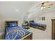 Shared bedroom featuring blue basketball themed bedspreads, carpet flooring, and a ceiling fan at 4205 Cobble Trot Way, Johns Island, SC 29455