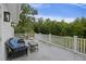 Comfortable covered balcony overlooking the lush greenery; great outdoor entertaining space at 4205 Cobble Trot Way, Johns Island, SC 29455