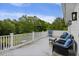 Comfortable balcony overlooking the lush greenery; great outdoor entertaining space at 4205 Cobble Trot Way, Johns Island, SC 29455