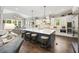 Spacious kitchen features a large center island, modern lighting, and stainless steel appliances at 4205 Cobble Trot Way, Johns Island, SC 29455