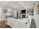 Inviting living room boasts coffered ceiling, fireplace and open access to staircase at 4205 Cobble Trot Way, Johns Island, SC 29455