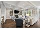Spacious living room with coffered ceilings, a fireplace, and an open floor plan at 4205 Cobble Trot Way, Johns Island, SC 29455