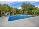 Backyard pool area with slide, lounge chairs, playground, and fenced yard at 4205 Cobble Trot Way, Johns Island, SC 29455