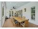 Wide covered porch with ceiling fan and spacious seating area at 4205 Cobble Trot Way, Johns Island, SC 29455
