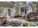 This backyard features a patio and a partially screened in porch at 4233 Lady Banks Ln, Ravenel, SC 29470