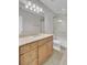 This bathroom features a shower with glass door, granite counters, and tile floors at 4233 Lady Banks Ln, Ravenel, SC 29470