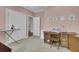 Craft room with a sewing machine, ironing board, and closet storage space at 4233 Lady Banks Ln, Ravenel, SC 29470