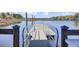 Wide wooden dock with stainless steel railing, offering lovely water views at 4233 Lady Banks Ln, Ravenel, SC 29470