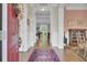 Elegant foyer featuring hardwood floors, a decorative rug, and views into other rooms at 4233 Lady Banks Ln, Ravenel, SC 29470