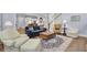 Cozy living area with elegant furniture and ample seating at 4233 Lady Banks Ln, Ravenel, SC 29470
