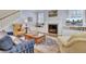 Inviting living room with fireplace, built-ins, and comfortable seating at 4233 Lady Banks Ln, Ravenel, SC 29470