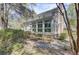 This home features a lovely sunroom addition with large windows and plenty of natural light at 4233 Lady Banks Ln, Ravenel, SC 29470