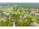 A view of homes within a community next to a golf course with scenic water features at 4291 Turtle Landing Ct, Johns Island, SC 29455