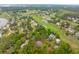 A birds-eye view of a golf course community with verdant trees and manicured fairways at 4291 Turtle Landing Ct, Johns Island, SC 29455