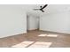 Bright bedroom with hardwood floors, white trim, and a modern ceiling fan at 4291 Turtle Landing Ct, Johns Island, SC 29455
