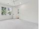 Large bedroom features a ceiling fan, 2 windows, and en suite bathroom at 4291 Turtle Landing Ct, Johns Island, SC 29455