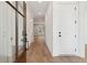 Bright entryway with light hardwood floors and white paneled doors create a welcoming interior atmosphere at 4291 Turtle Landing Ct, Johns Island, SC 29455