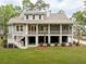 Lovely two-story home with a rear porch perfect for outdoor entertaining and relaxing at 4291 Turtle Landing Ct, Johns Island, SC 29455