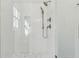 The tile shower has multiple shower heads and white subway tile surround at 4291 Turtle Landing Ct, Johns Island, SC 29455