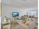 Bright and airy living room with neutral colors, plush seating, and plenty of natural light at 4966 Hay Bale Ct, Summerville, SC 29485