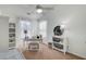Bright office space with desk, chair, shelving and natural light at 4966 Hay Bale Ct, Summerville, SC 29485